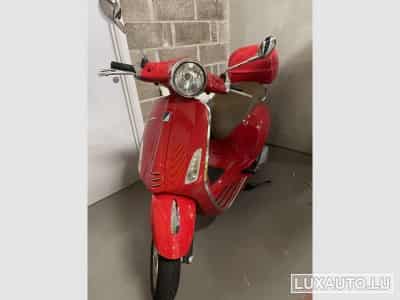 Piaggio Vespa Back storage box; winter blanket. Red (2017) - Photo 1