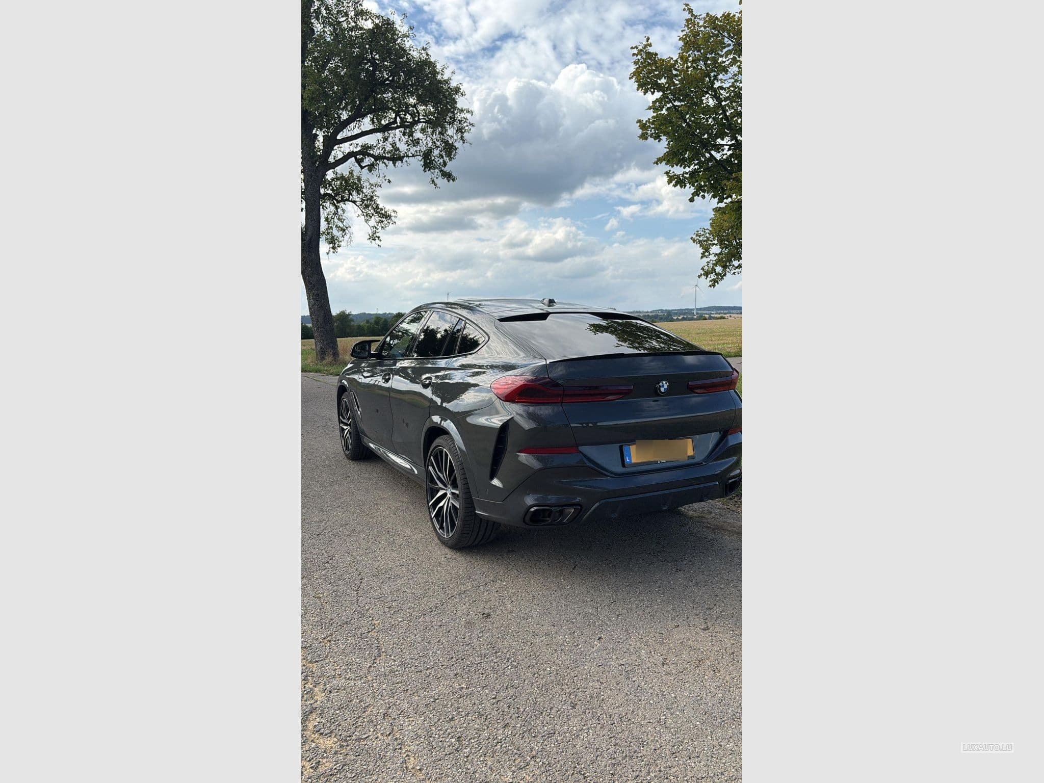 BMW X6M 60i (2023) - Photo 6