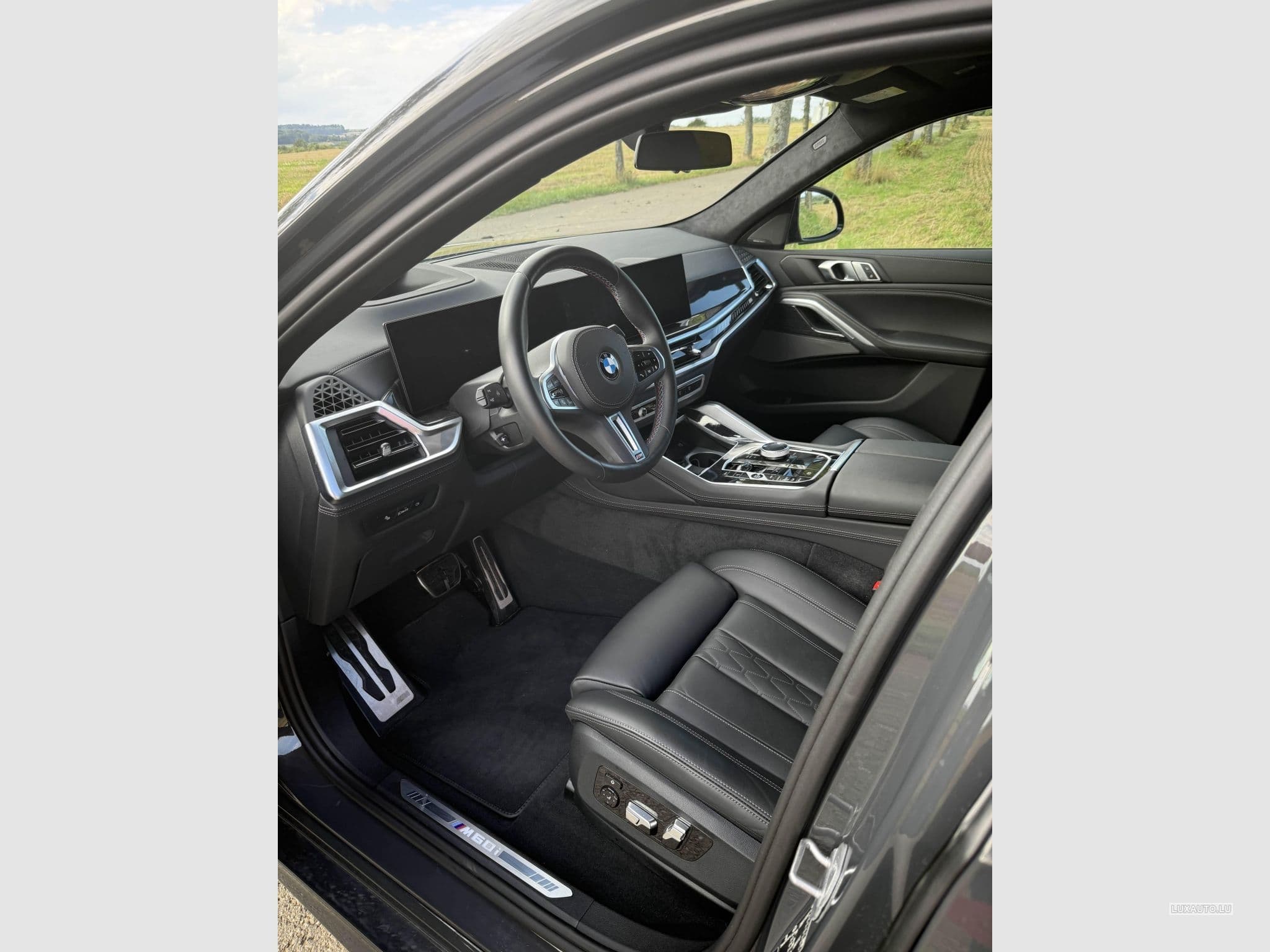 BMW X6M 60i (2023) - Photo 8
