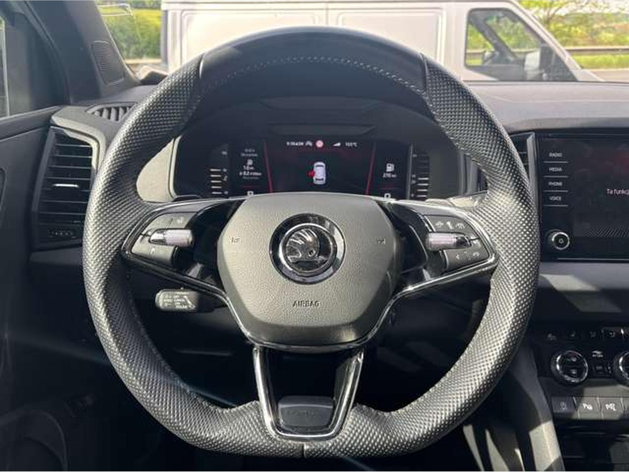 Skoda Karoq 2.0 TSI 4x4 DSG Sportline-GARANTIE JUSQU'A 48 MOIS (2023) - Photo 13