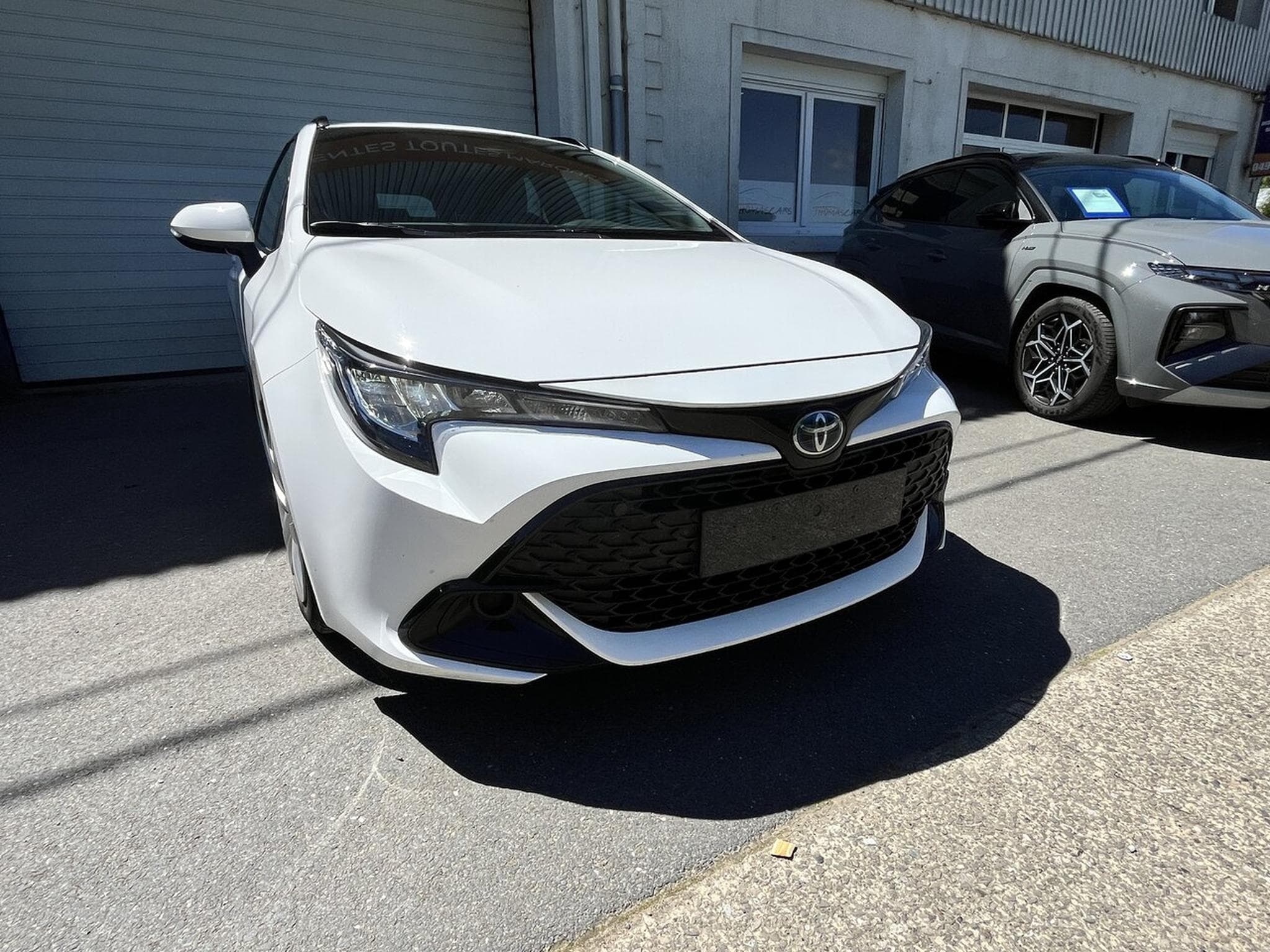 Toyota Corolla TOURING HYBRIDE 122 CH - LED -Caméra - Cruise - Garantie bat (2024) - Photo 10