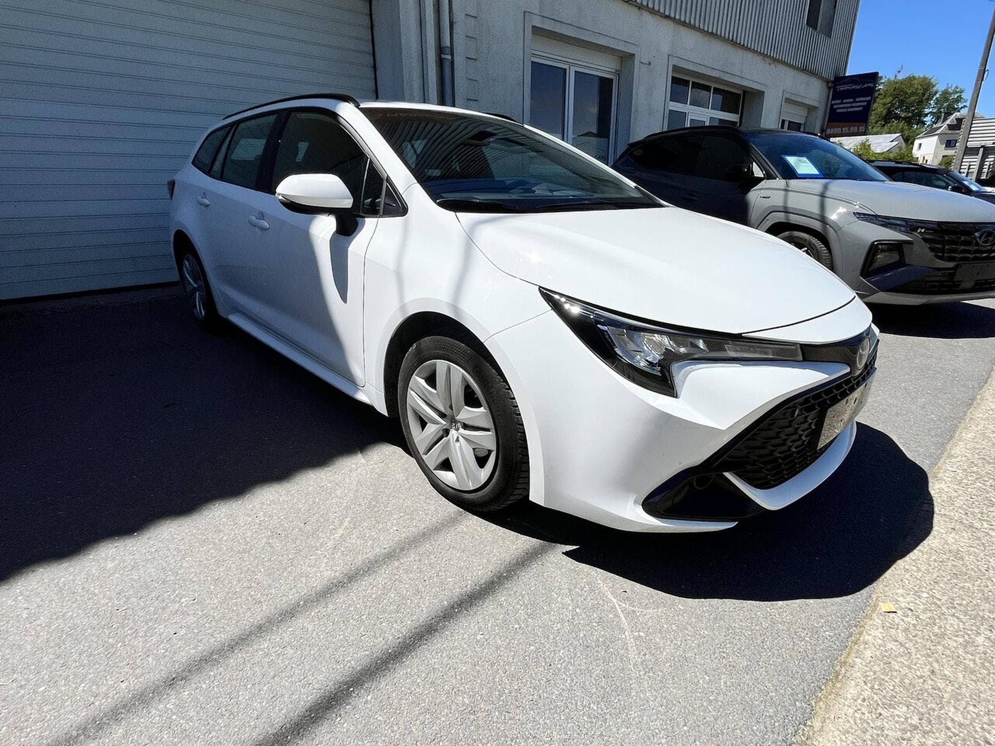 Toyota Corolla TOURING HYBRIDE 122 CH - LED -Caméra - Cruise - Garantie bat (2024) - Photo 9