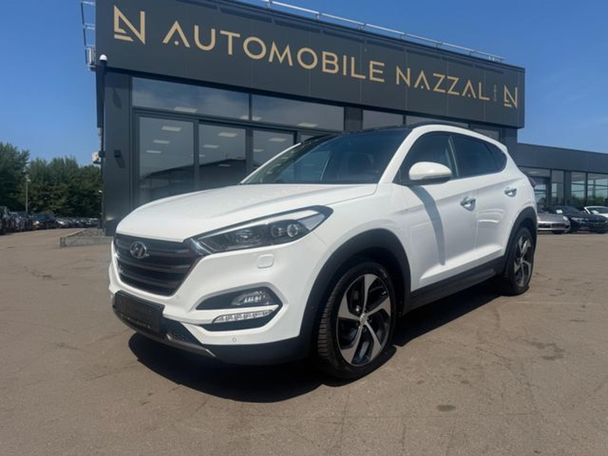 Hyundai TUCSON TUCSON PREMIUM 4WD *1.HD*AUT*LEDER*XENON* (2015) - Photo 1