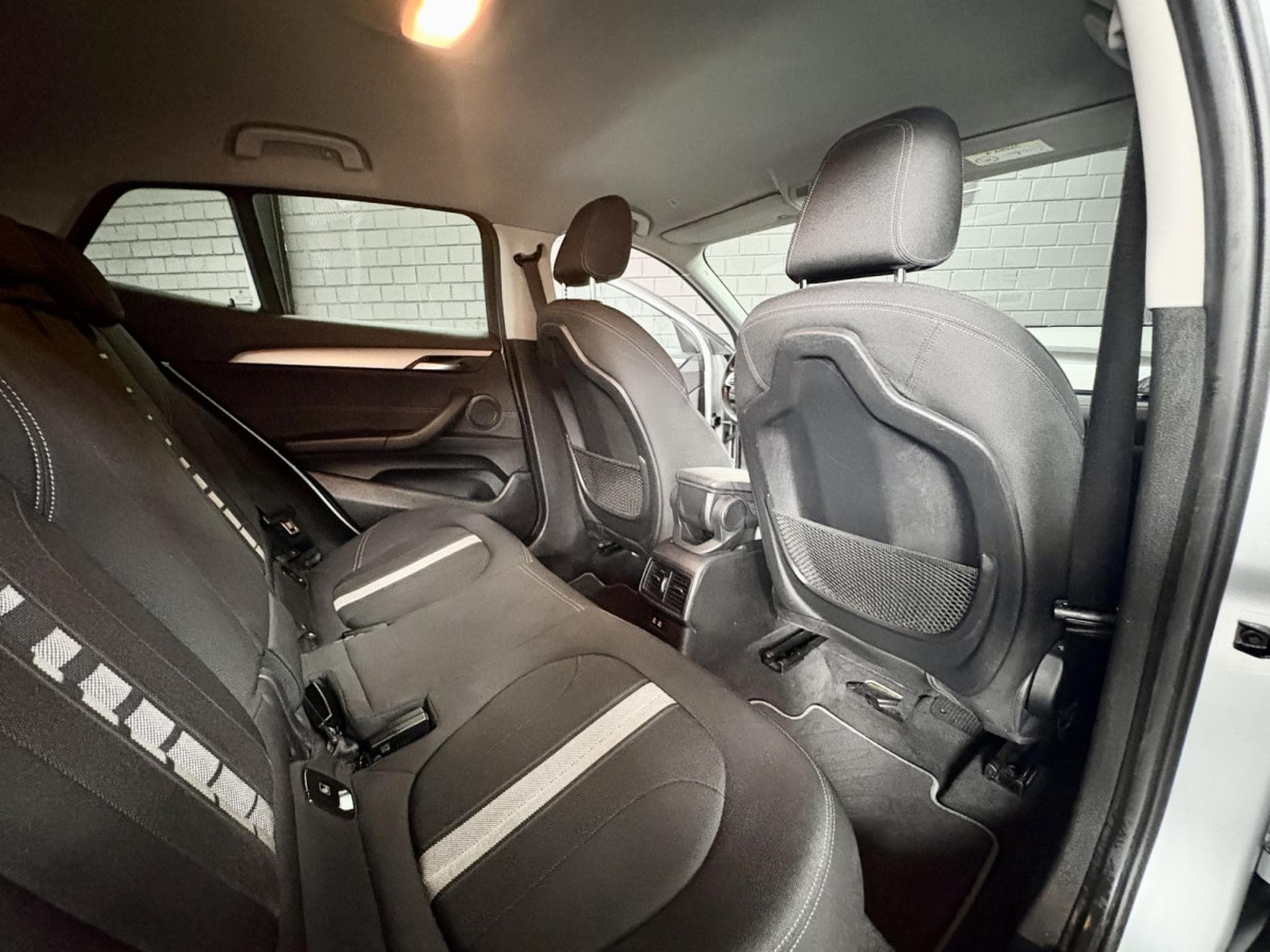BMW X2 18i sDrive *CAMERA* *PDC* SIEGES CHAUFF.* (2019) - Photo 22