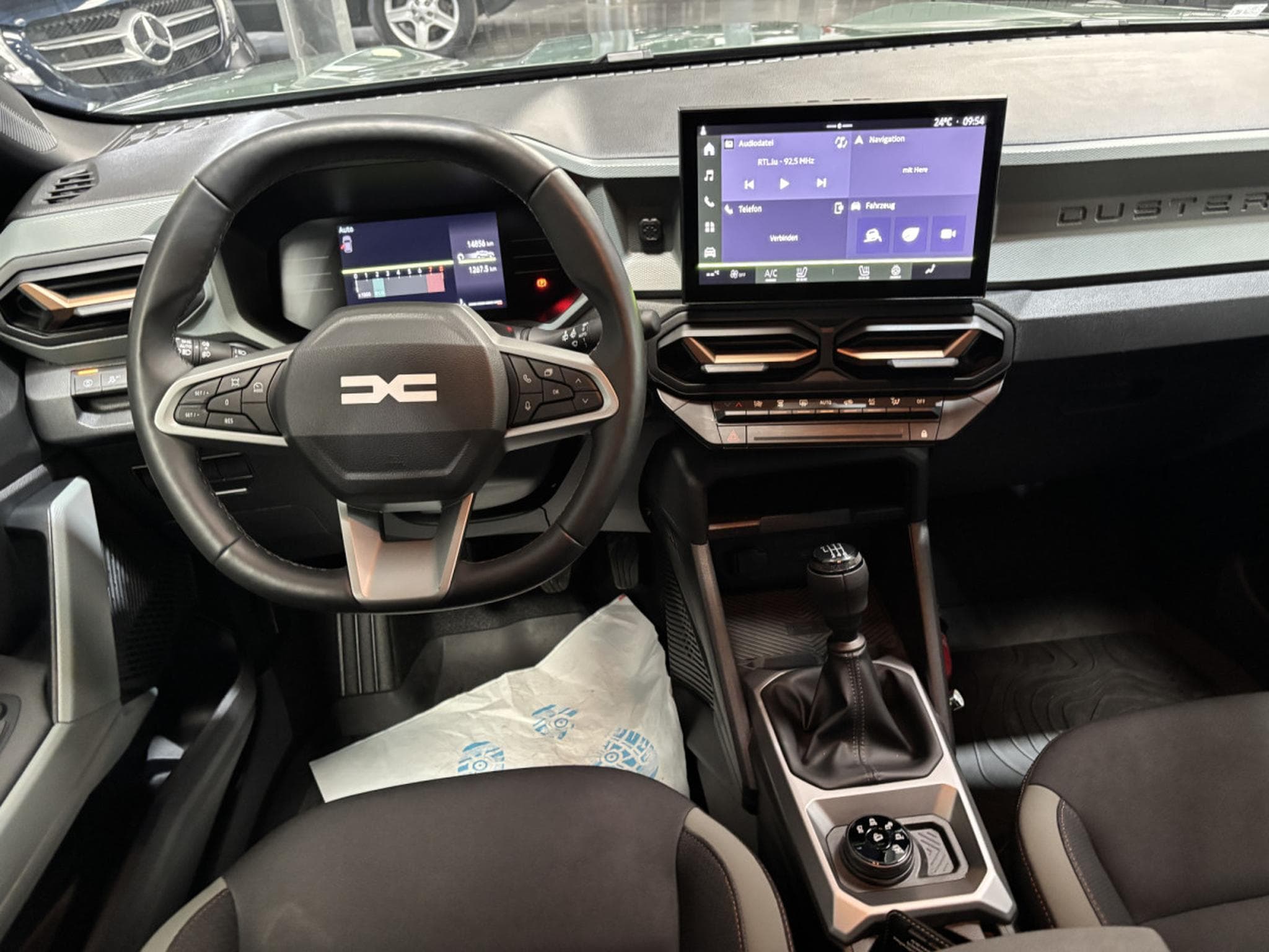 Dacia Duster 1.2 Hybrid 4WD (2025) - Photo 11