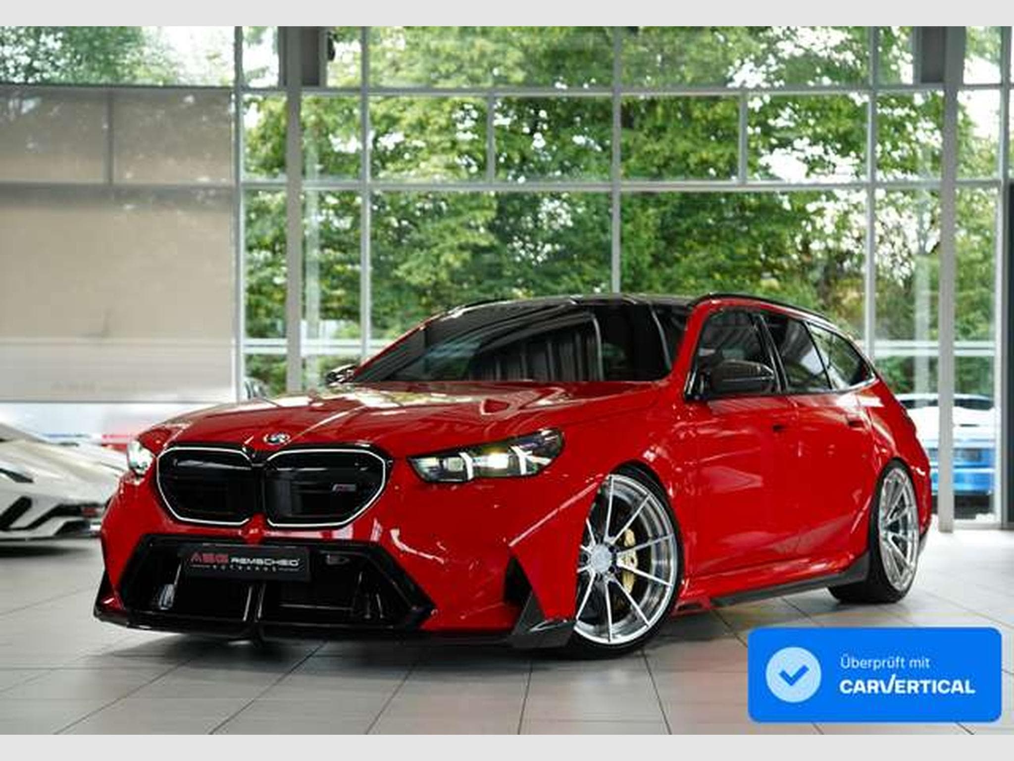BMW M5 Touring 1.H *Carbon*Keramik*Grail*RossoCorsa (2025) - Photo 1