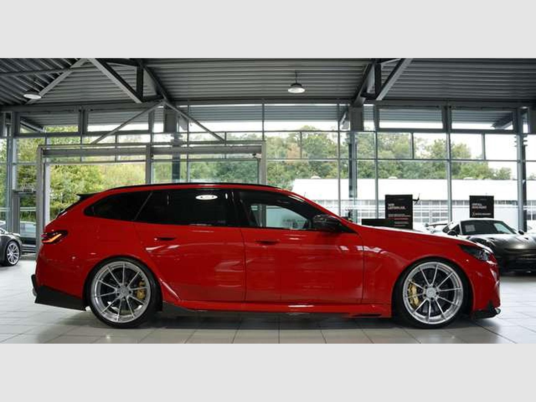 BMW M5 Touring 1.H *Carbon*Keramik*Grail*RossoCorsa (2025) - Photo 6